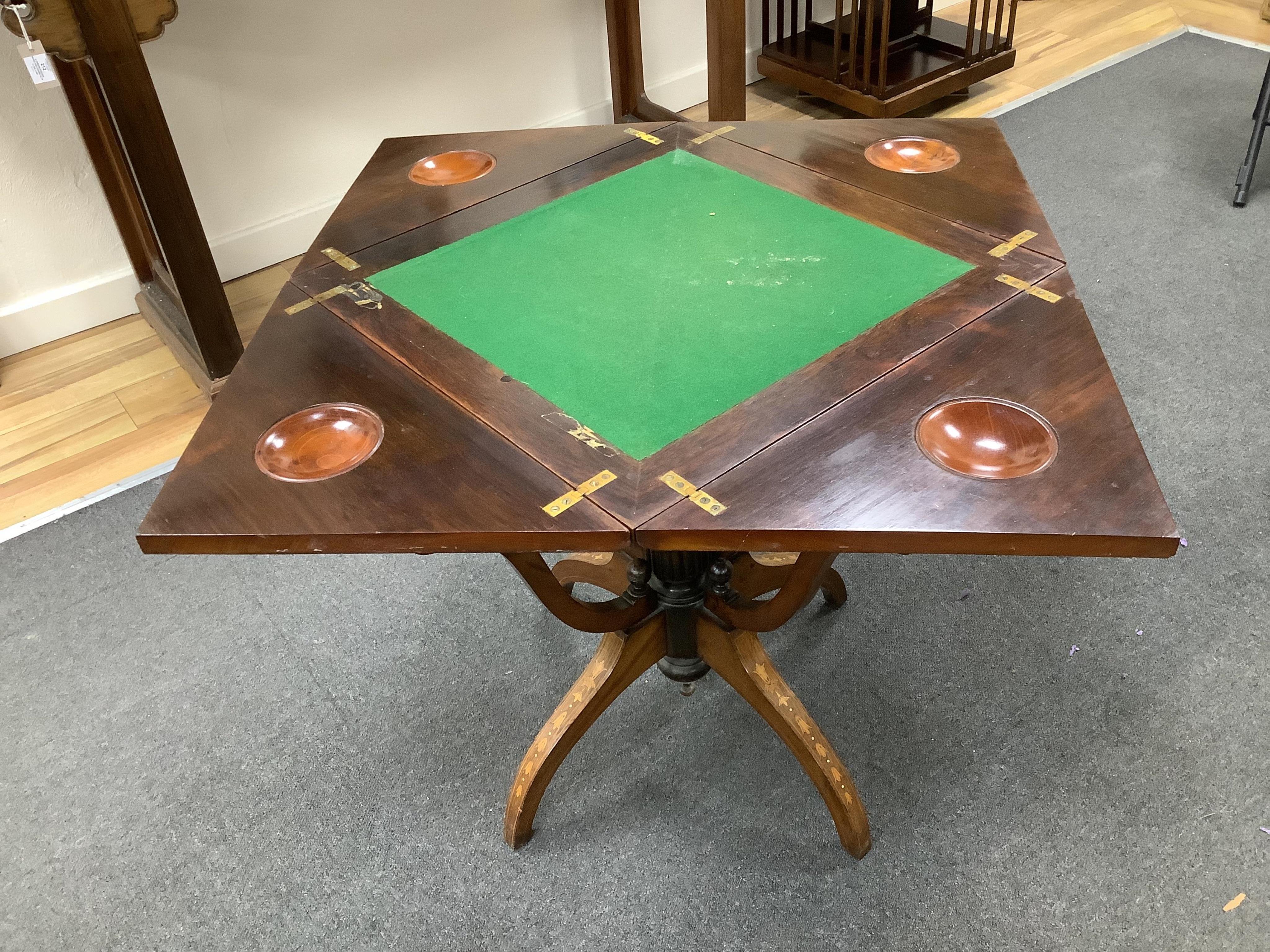 A late Victorian inlaid rosewood envelope card table, width 55cm, depth 55cm, height 71cm. Condition - fair